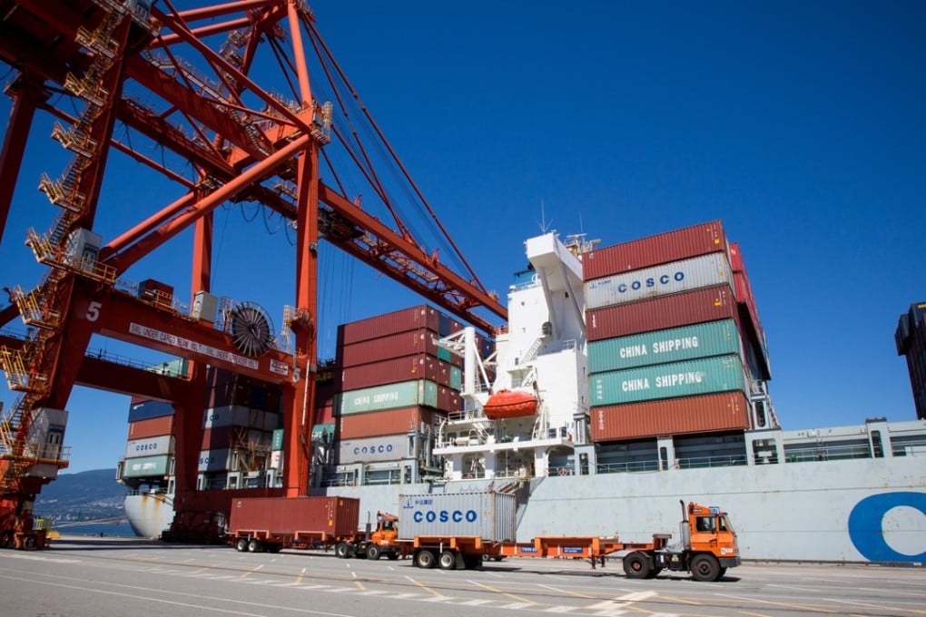 A China Ocean Shipping Group Co. (COSCO) cargo ship is unloaded at the Port of Vancouver terminal in Vancouver, British Columbia, Canada. Photo: Bloomberg