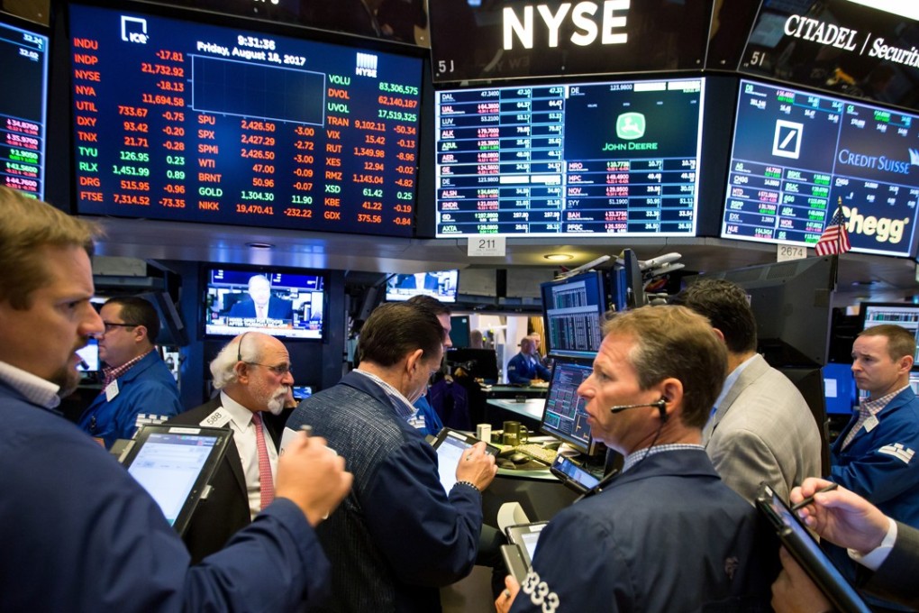 Traders work on the floor of the New York Stock Exchange as share prices weakened because of worries about President Donald Trump’s agenda and the terrorist attacks in Spain. Photo: Bloomberg