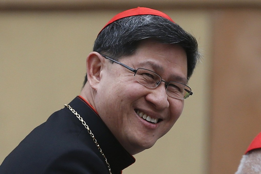 Filipino Cardinal Luis Antonio Tagle (left) arrives for a meeting at the Synod Hall in the Vatican in 2013. Photo: Reuters