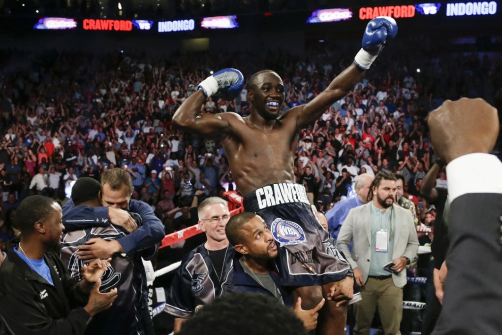 Terence Crawford celebrates his victory by knockout over Julius Indongo. Photo: AP