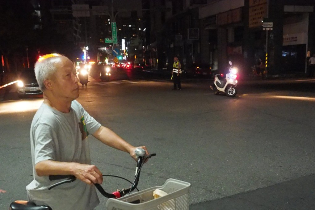 Darkness on the streets of Taipei following Tuesday’s power cut. Photo: EPA