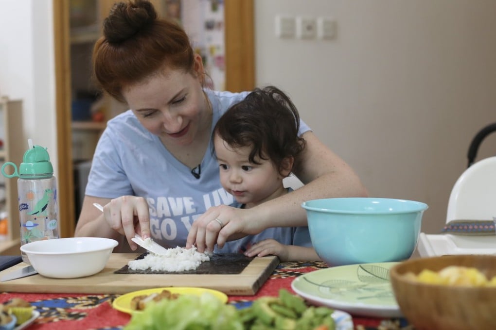 Vegan parent Emily Sim and her son Henry at home in Pok Fu Lam. Photo: Nora Tam