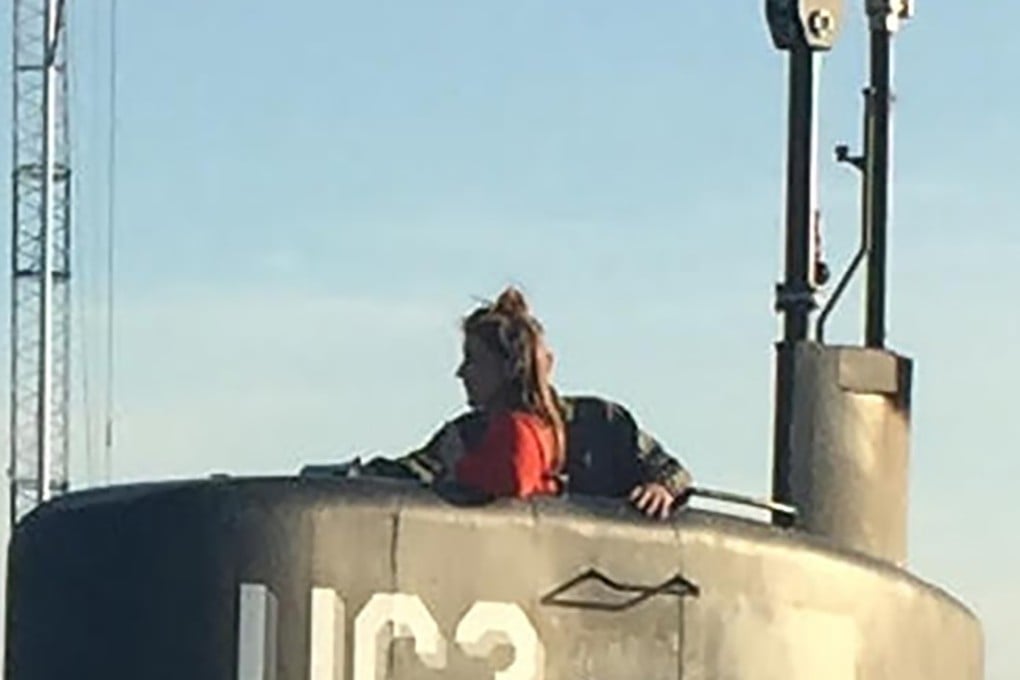 Swedish journalist Kim Wall stands in the tower of the private submarine ‘UC3 Nautilus’ before she disappeared. Photo: AFP