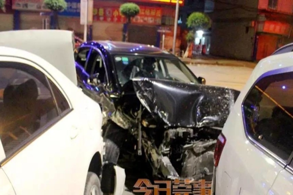 The couple’s car suffered extensive damage in the incident in Dongguan, Guangdong province. Photo: Handout