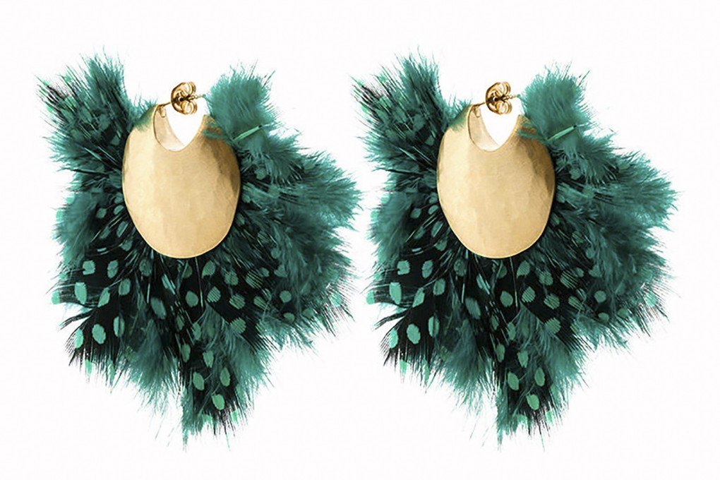 Check out the Paule Ka asymmetric gown in a gorgeous blue and the spectacular Katerina Makriyianni feather earrings in green