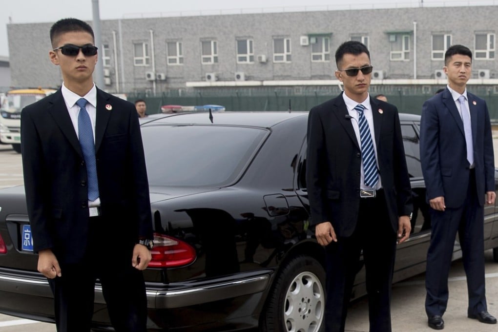A company from Qingdao is planning to launch an app that will allow people to rent bodyguards by the hour. Photo: AP