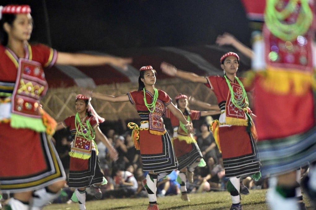Members of the Amis indigenous group dancing during the traditional harvest festival in eastern Taiwan. Photo: AFP