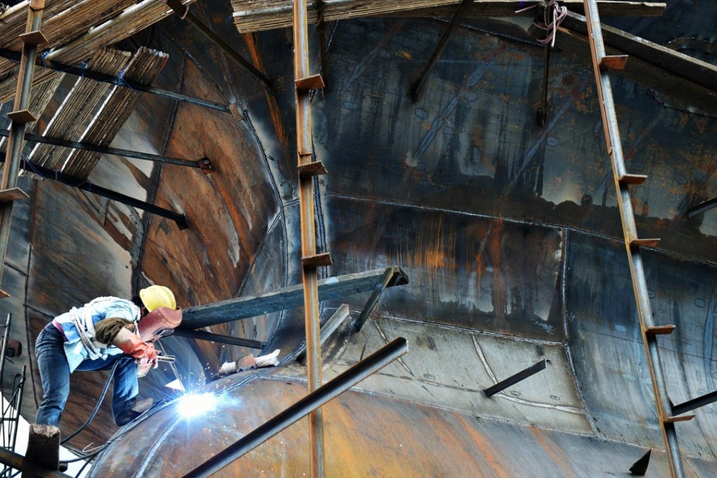 China’s latest state enterprise reform to push for mixed-ownership structures is aimed at reinforcing the state’s control in the biggest companies and dictating how the private sector makes its investments. Photo: AFP