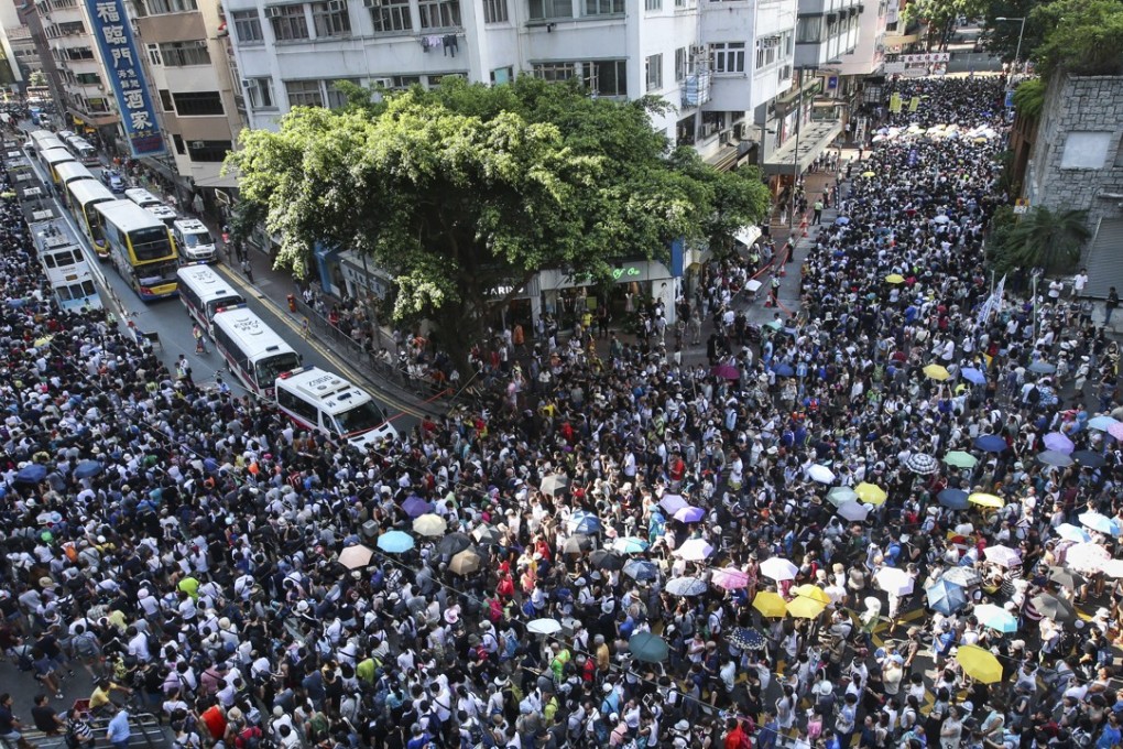 Thousands joined a march to protest against the jailing of pro-democracy activists. Photo: David Wong