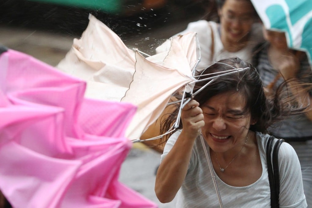 People braved the strong winds as Typhoon Vincente approached the city in 2012. Photo: David Wong