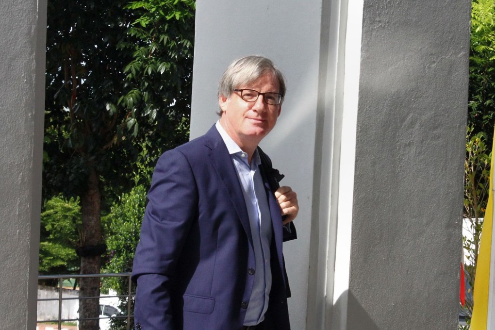 BBC foreign correspondent Jonathan Head arrives at court to fight defamation charges brought against him by a Thai lawyer in Phuket. Photo: AFP
