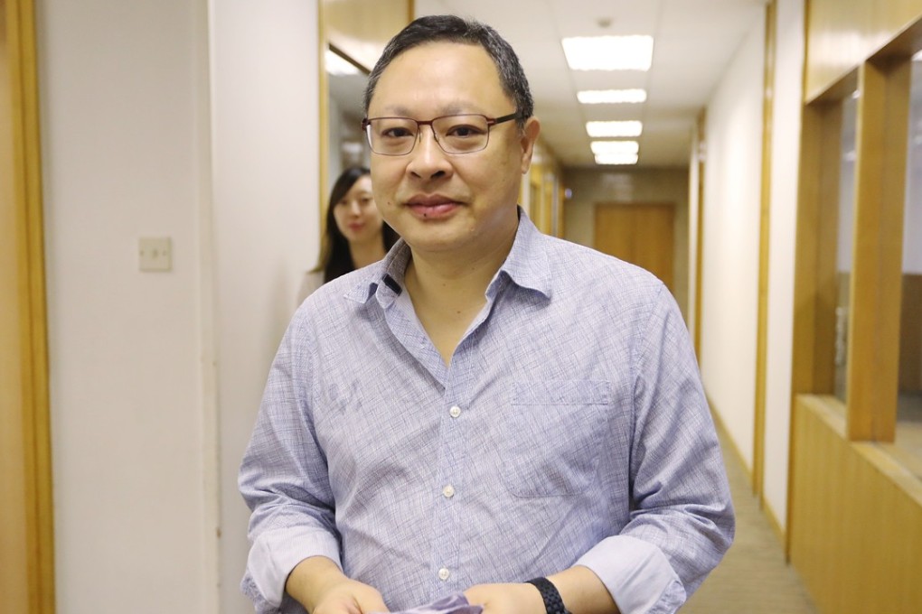 Professor Benny Tai Yiu-ting attends a radio programme on the jailing of three Occupy activists (Nathan Law Kwun-chung, Joshua Wong Chi-fung, Alex Chow Yong-kang) at Commercial Radio in Kowloon Tong. Photo: Edward Wong