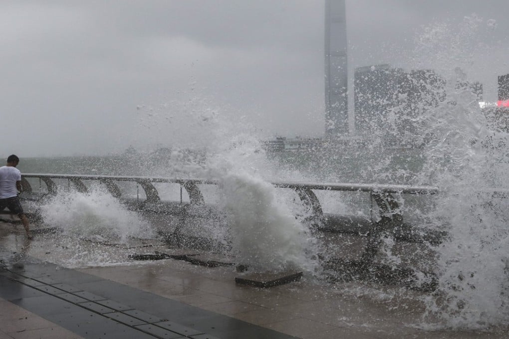 Waves surge at the Wan Chai waterfront as Typhoon Hato hits the city. Photo: Nora Tam