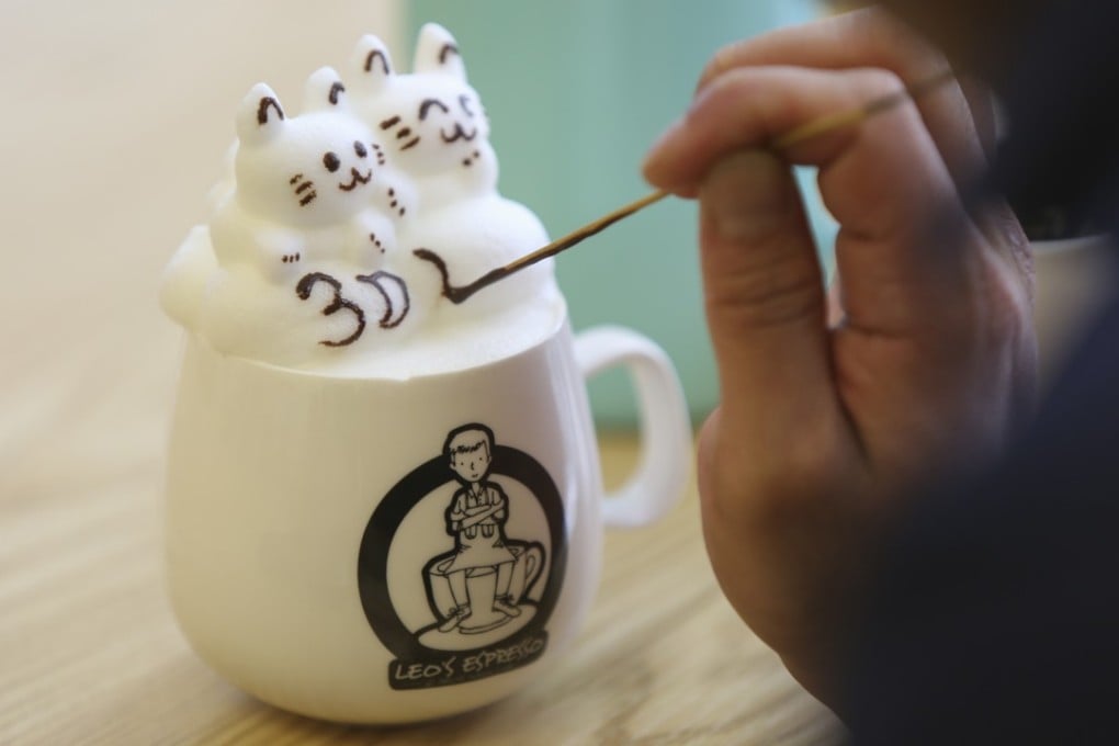 Leo Chau creates 3D latte kittens at his cafe in Admiralty. Photo: Xiaomei Chen