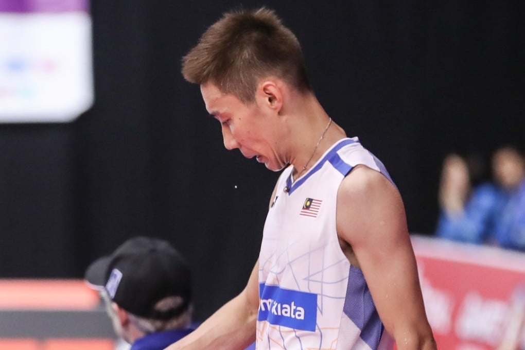 Lee Chong Wei reacts after his defeat in the first round against Brice Leverdez. Photo: Xinhua