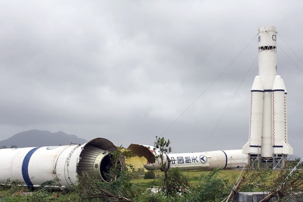 Typhoon Hato damaged two rocket models outside the Zhuhai Aviation Industry Park, where a large-scale airshow was held last year. Photo: Imaginechina