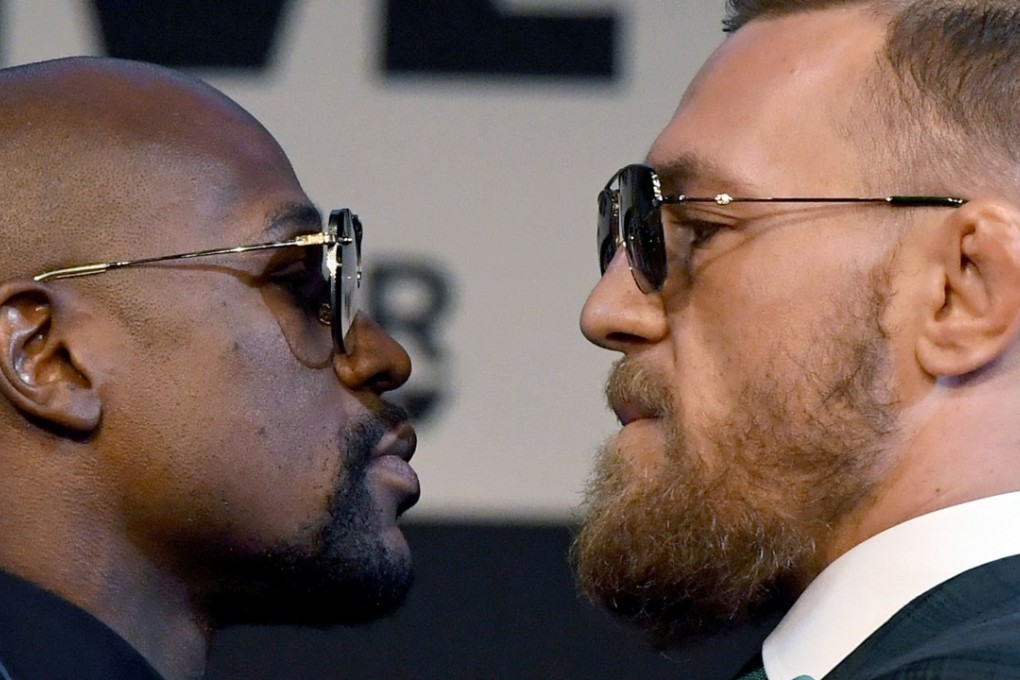 Floyd Mayweather Jnr and Conor McGregor face-off during a media conference at the KA Theatre at MGM Grand. Photo: AFP