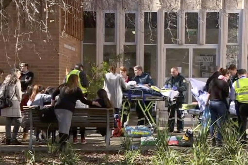 Injured students are attended to at Australian National University in Canberra. Photo: AP