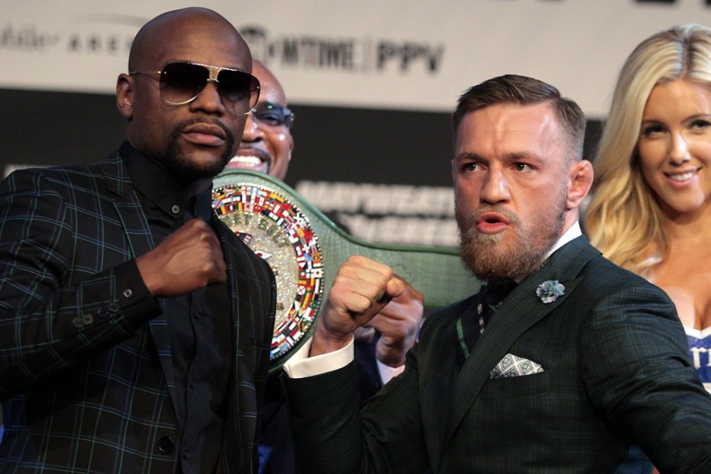 Boxer Floyd Mayweather Jnr and MMA fighter Conor McGregor pose at the MGM Grand in Las Vegas ahead of their 12-round contest under boxing rules this weekend, tipped to become the richest fight in history. Photo: AFP