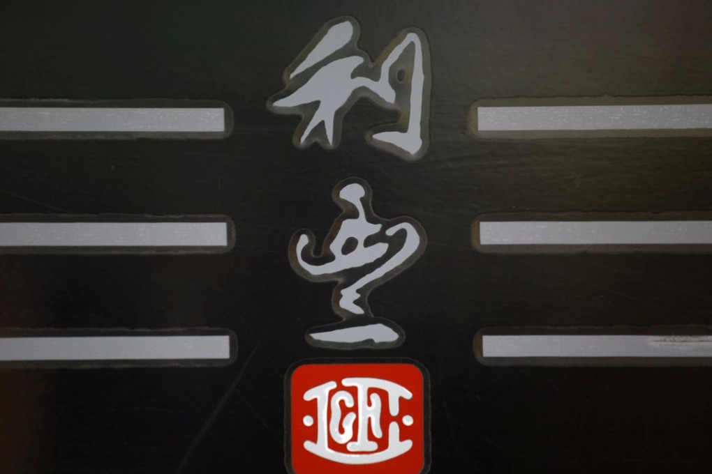 The Li & Fung company logo as displayed on a glass door at Li Fung Tower. Photo: Reuters