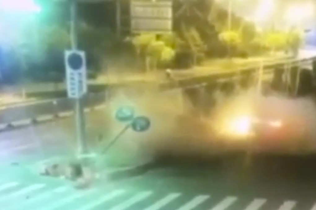 A still from the video clip shows the BMW on fire after the crash. Photo: Handout