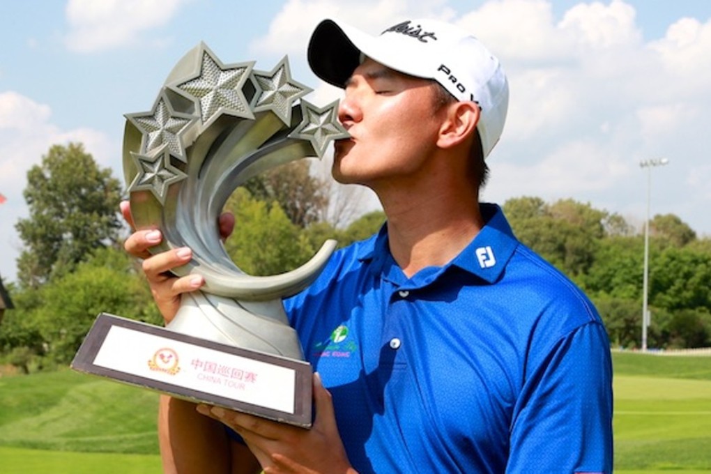 Hong Kong's Jason Hak kisses the trophy after winning the CGD Yunnan Championship in Kunming. Photos: China Tour