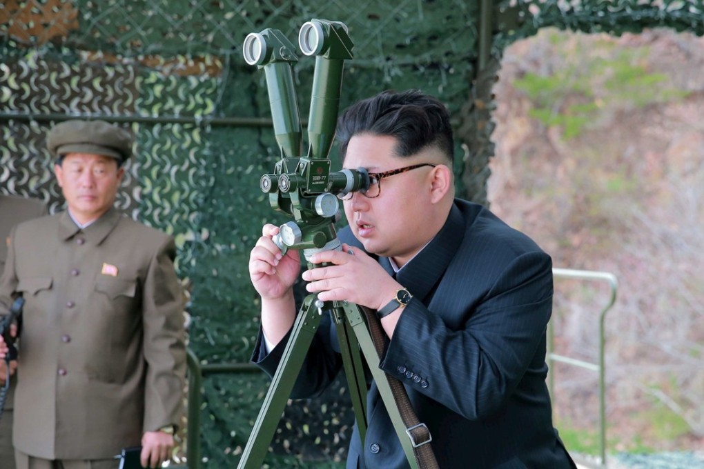 North Korean leader Kim Jong-un guides on the spot the underwater test-fire of a strategic submarine ballistic missile in this photo released by North Korea's Korean Central News Agency (KCNA) in Pyongyang. Photo: KCNA via Reuters