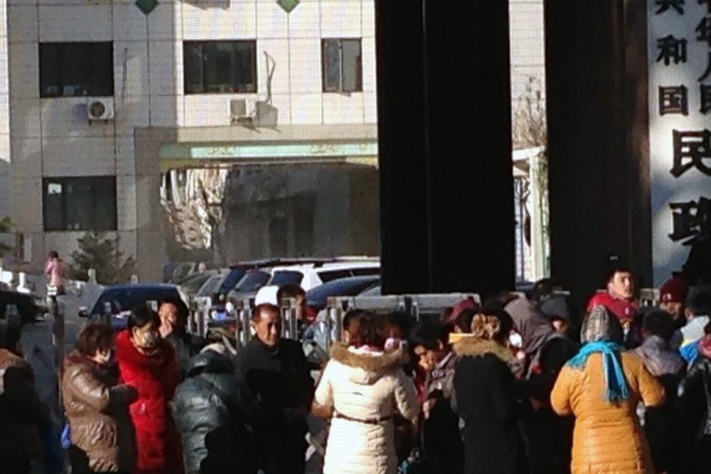 Aids activists petition in front of the Ministry of Civil Affairs in Beijing. Photo: Handout