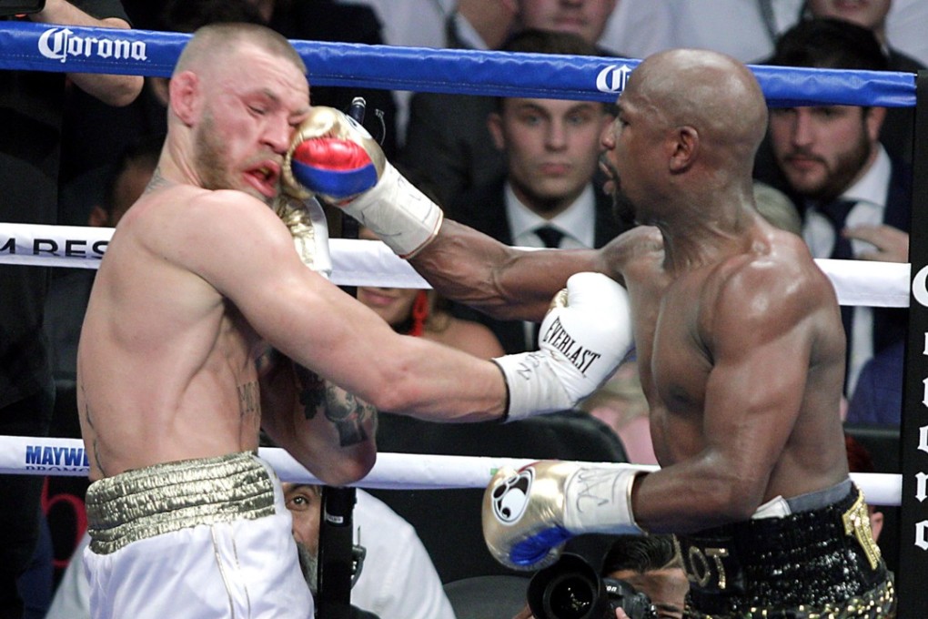 Floyd Mayweather Jnr outclassed Conor McGregor with a 10th-round stoppage to win their money-spinning superfight and clinch his 50th straight victory. Photo: AFP