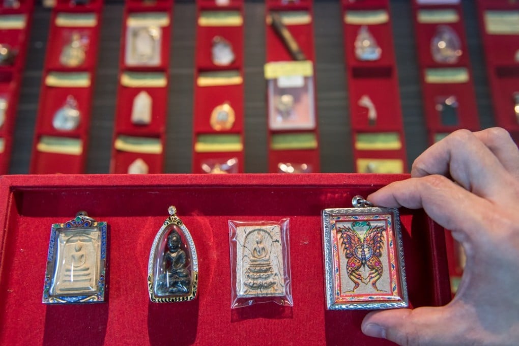 Thai amulets in Amulet Studio, a shop in Fu Lu Shou, a shopping mall specialising in religious and mystic merchandise in central Singapore.