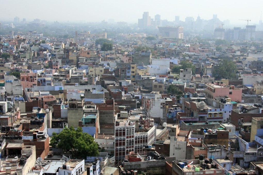 Physical boundaries – such as between those who ride in air-conditioned cars and those who walk the Delhi streets – abound in Preti Taneja’s novel. Photo: Shutterstock