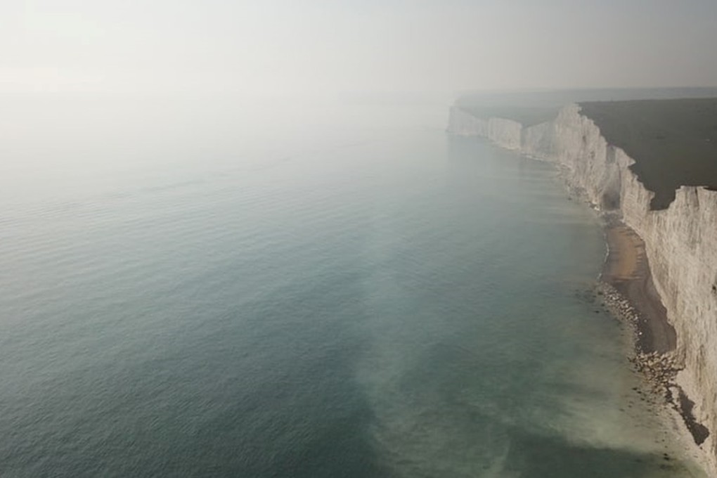 The toxic haze rolls over Beachy Head, near Birling Gap, on Sunday. Photo: Jacob Ward