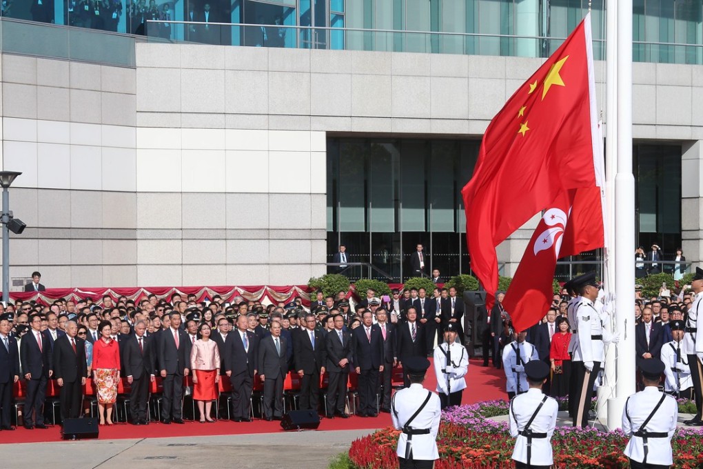 A flag-raising ceremony at the Golden Bauhinia Square, Wan Chai, to mark the 20th anniversary of the establishment of the Hong Kong Special Administrative Region. Photo: K. Y. Cheng