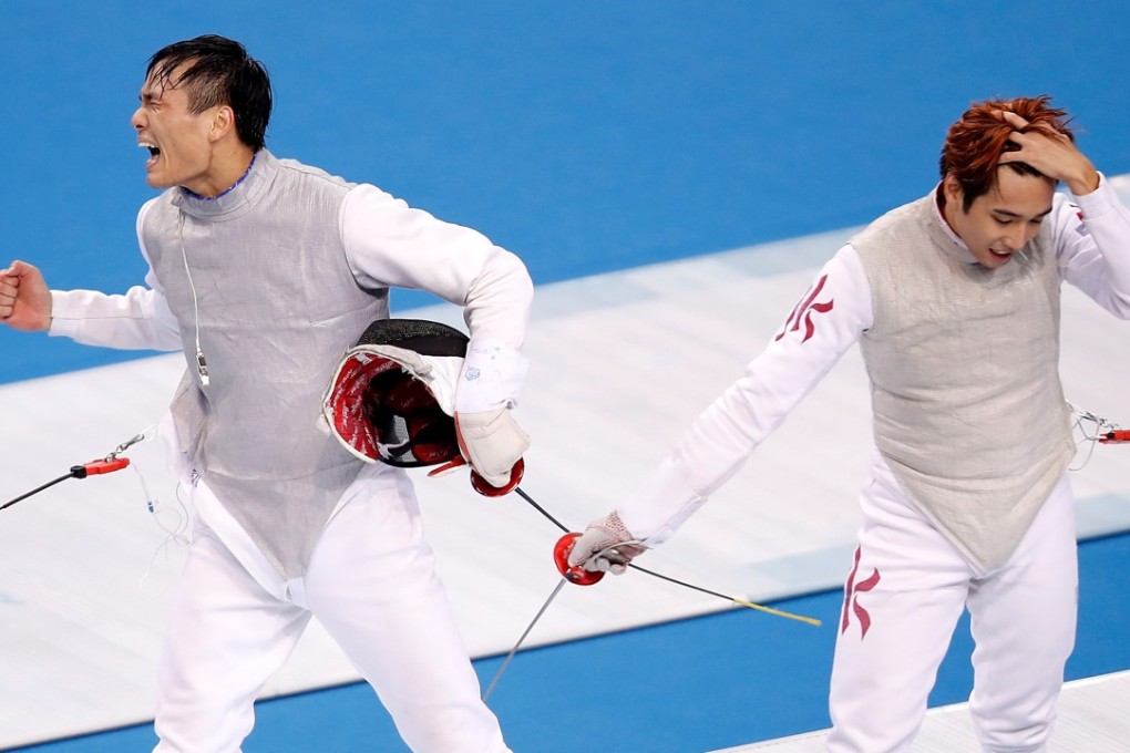 Fujian’s Chen Haiwei (left) celebrates as Hong Kong’s Nicholas Edward Choi is disappointed at the National Games in Tianjin. Photos: Xinhua