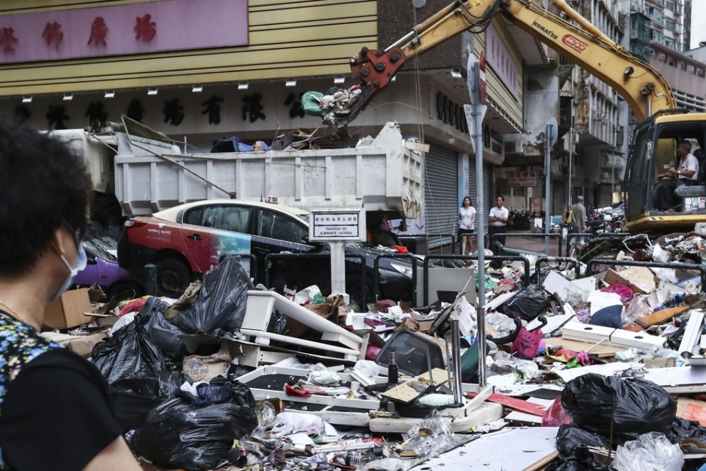 Clean-up operations in Macau following the damage caused by Typhoon Hato. Photo: Nora Tam