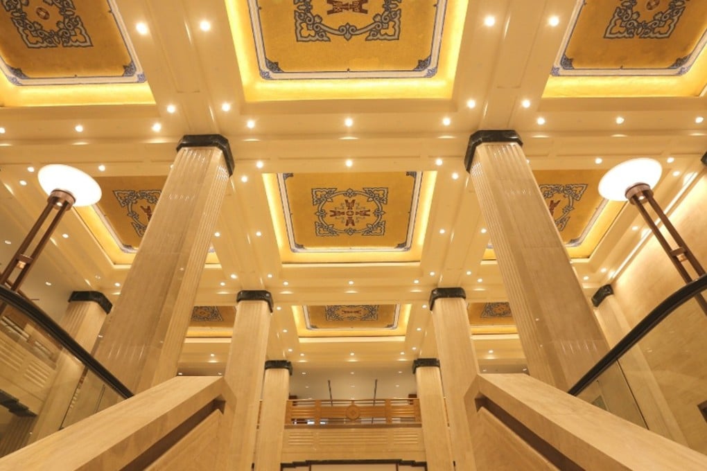 Architects Sandi Pei Li-chung – who’s father designed the new Bank of China Tower, and grandfather worked as its general manager in the old building – has been responsible for designing the new-look interior, restoring and preserving the original deco including its ceiling which is a mosaic of tiles depicting nine ancient Chinese characters for money. Photo: HANDOUT