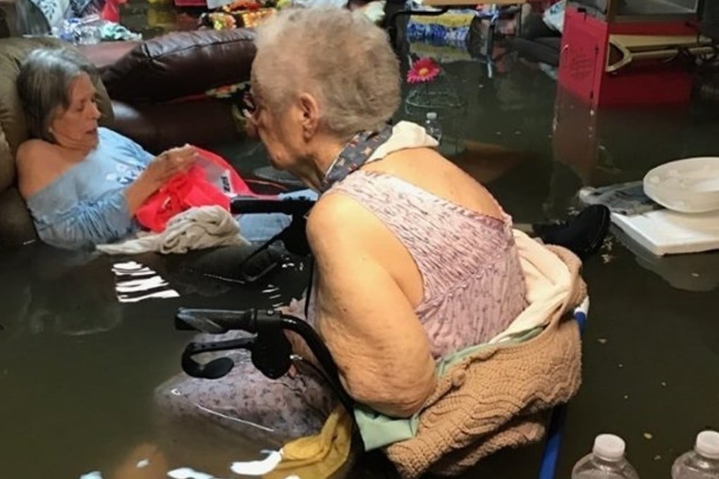 Elderly residents of the La Vita Bella nursing home in Dickinson, southeast Texas, await rescue from floodwaters on Sunday. Photo: Twitter / Timothy J. McIntosh