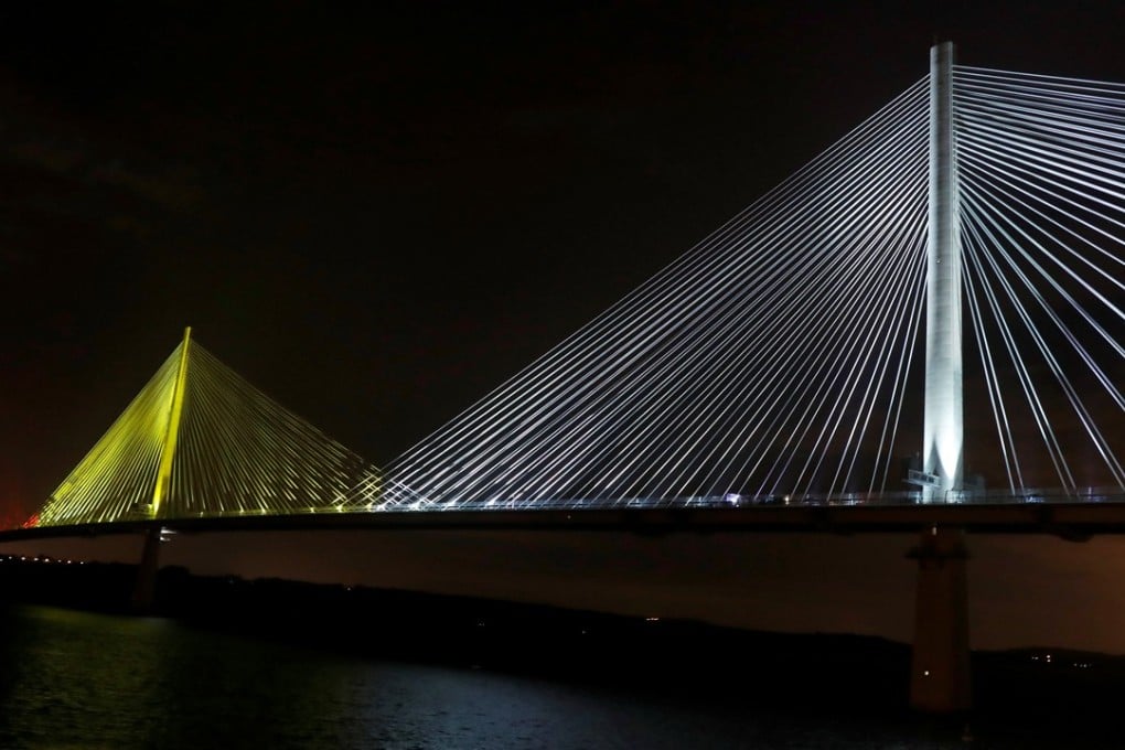 The Queensferry Crossing is illuminated to mark the ceremonial handover from the contractors to the Scottish Government on Monday. Photo: Reuters
