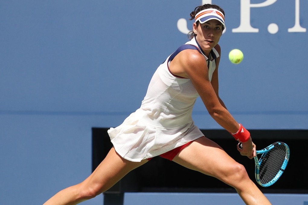 Garbine Muguruza of Spain hits a return to Varvara Lepchenko of the US during her first round stroll at the US Open. Photo: EPA
