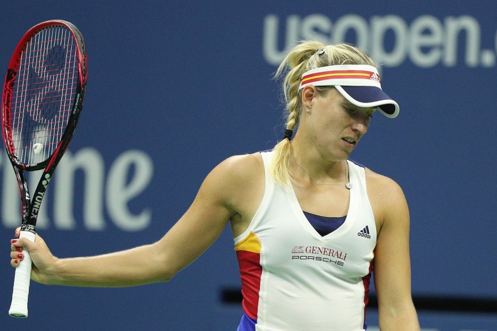Angelique Kerber of Germany reacts in disappointment while playing Naomi Osaka of Japan at the US Open where she became the first defending champion in 12 years to lose in the first round. Photo: EPA