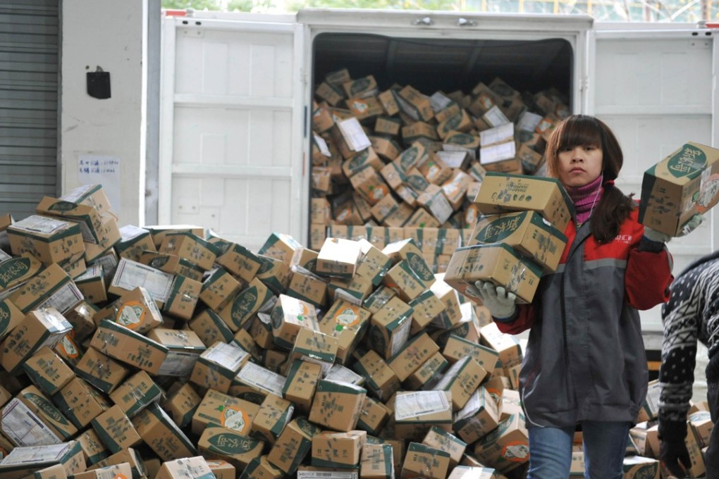 Staff at a logistic centre in Lin'an city in Zhejiang province on Nov. 11, 2016. E-commerce companies and courier services are scrambling to deal with the orders placed during the Singles Day shopping spree. Photo: Xinhua