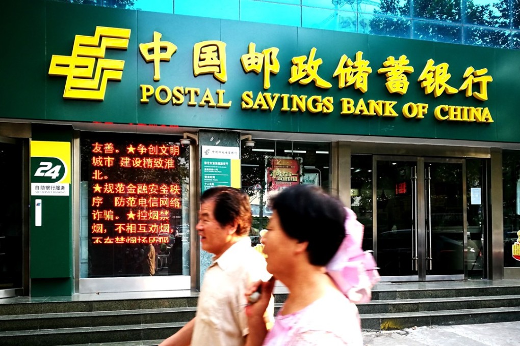 Postal Savings Bank of China operates the country’s largest bank branch network. It has 539 million individual account holders, or 40 per cent of the nation’s total population. Photo: Imaginechina