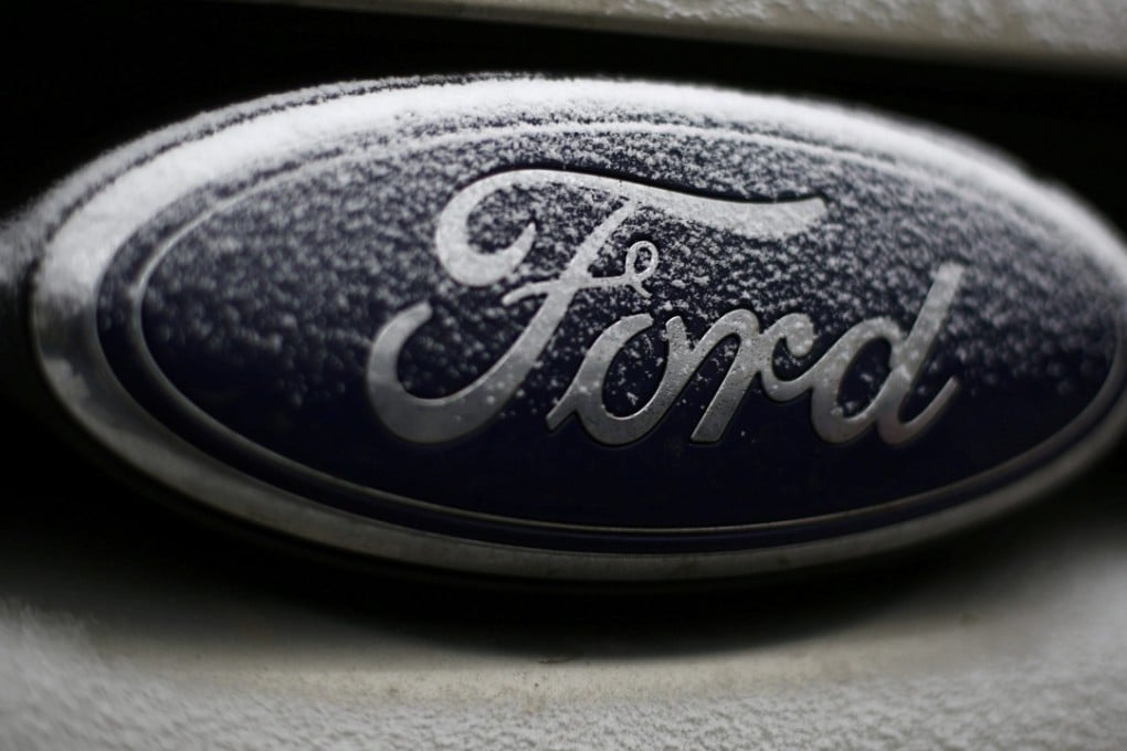 Snowflakes are seen on the badge of a Ford car in Warsaw, Poland. Photo: REUTERS/Kacper Pempel