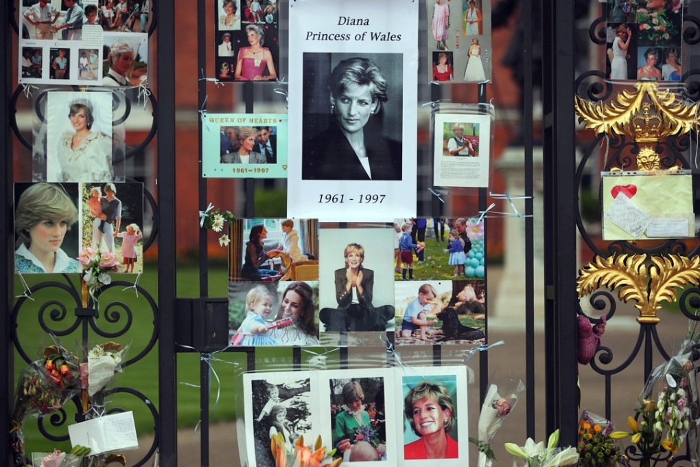 Flowers and tributes in memory of Diana are placed on the gates of her former residence, Kensington Palace in London. Photo: Reuters