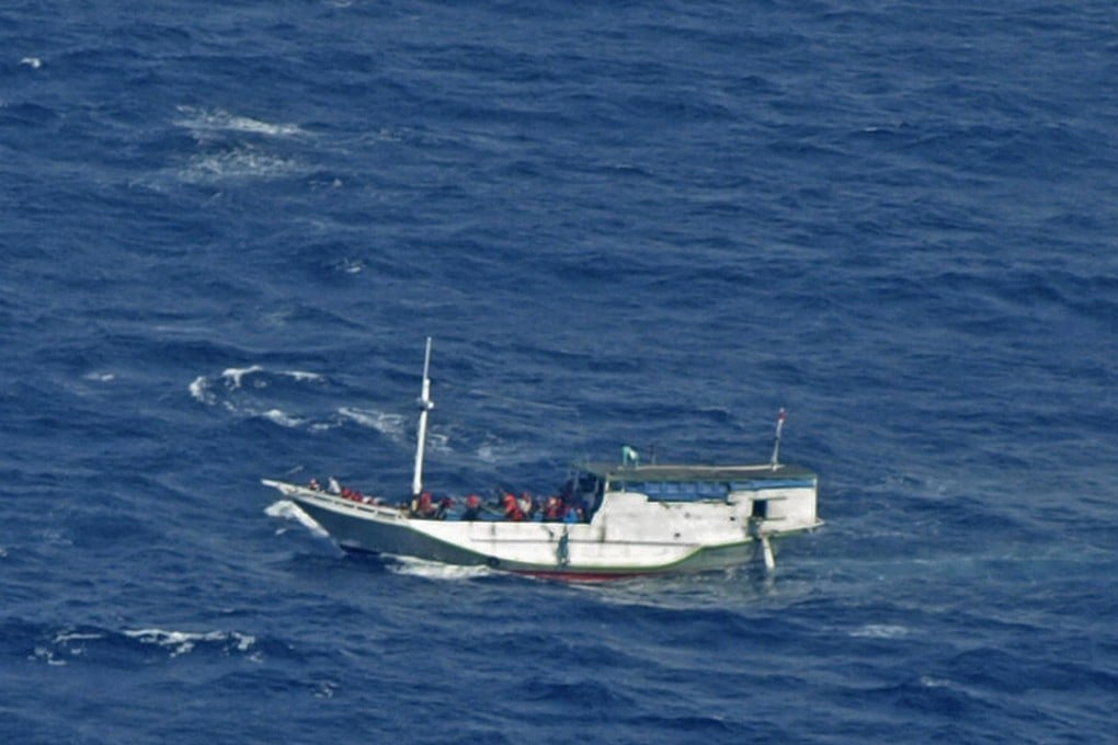 A wooden boat carrying asylum seekers in waters off Christmas Island, Australia in 2012. Since the tough measures were adopted, which the government says are essential to prevent deaths at sea, Australia has gone more than 1,000 days since the last asylum-seeker vessel reached its shores. File photo: AP