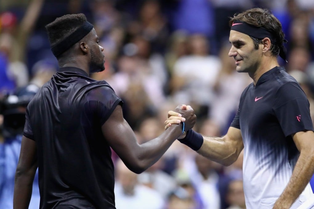 Frances Tiafoe congratulates Roger Federer after their epic match. Photo: AFP