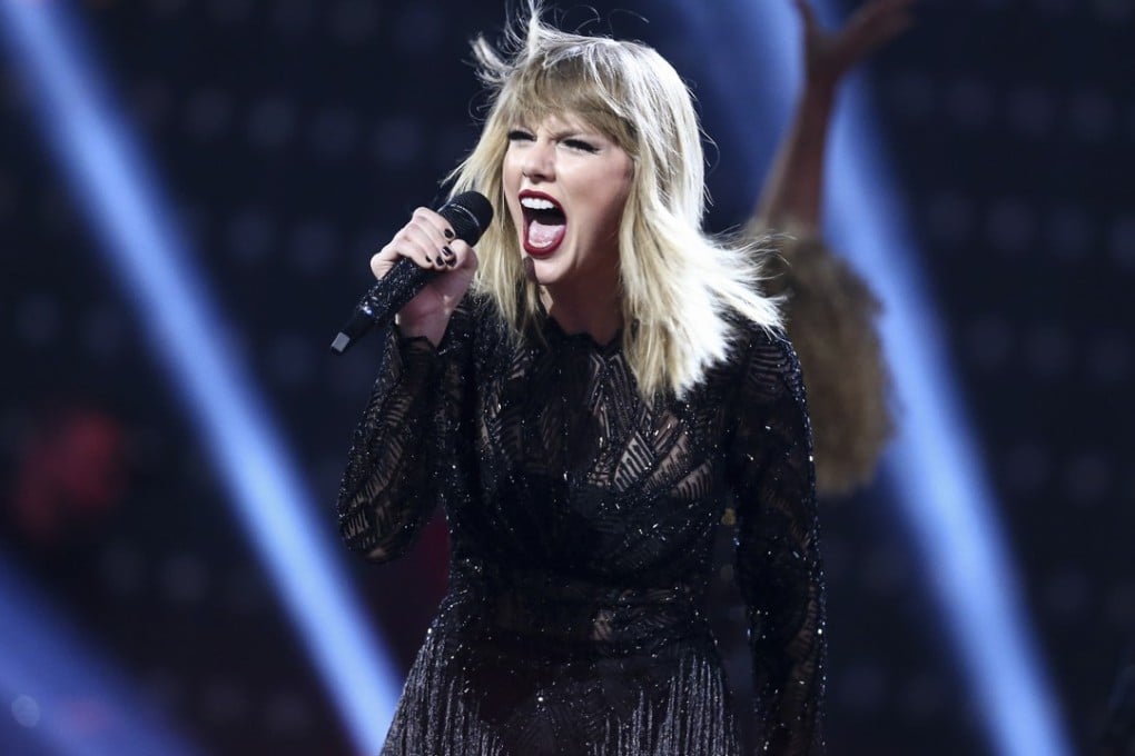 Taylor Swift performs at a concert in Texas. Her new video has the biggest YouTube debut ever. Photo: AP