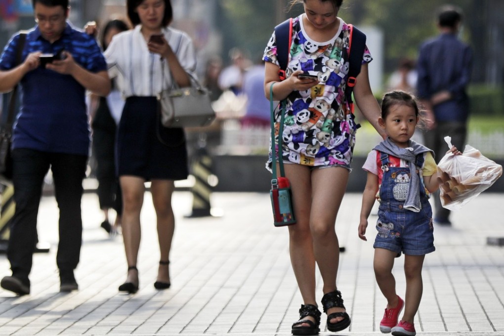 China Mobile, Unicom and China Telecom had a combined subscriber base of about 1.3 billion as of July 31. Photo: AP