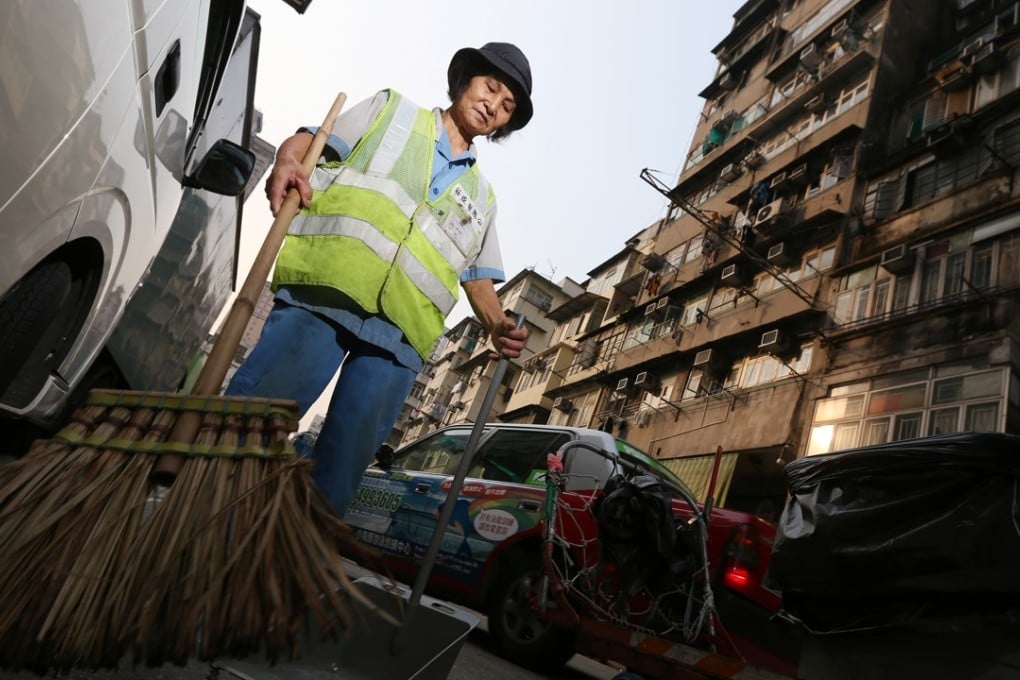 A street sweeper in Sham Shui Po. Pictures: SCMP