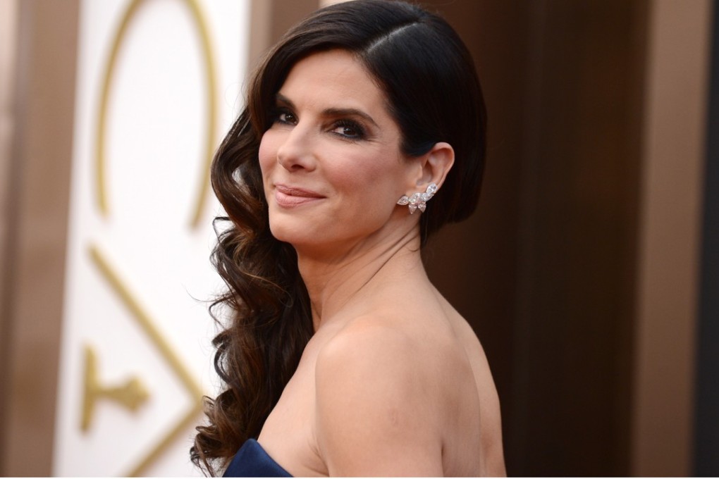 Sandra Bullock arrives at the Oscars at the Dolby Theatre, in Los Angeles. Photo: Jordan Strauss/AP